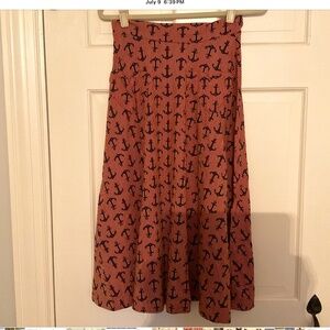 Fit and flare anchor design skirt